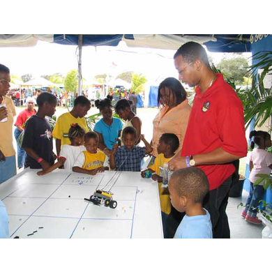 Marthious Clavier of the Cooperative Extension Service (CES) Interacts with Children